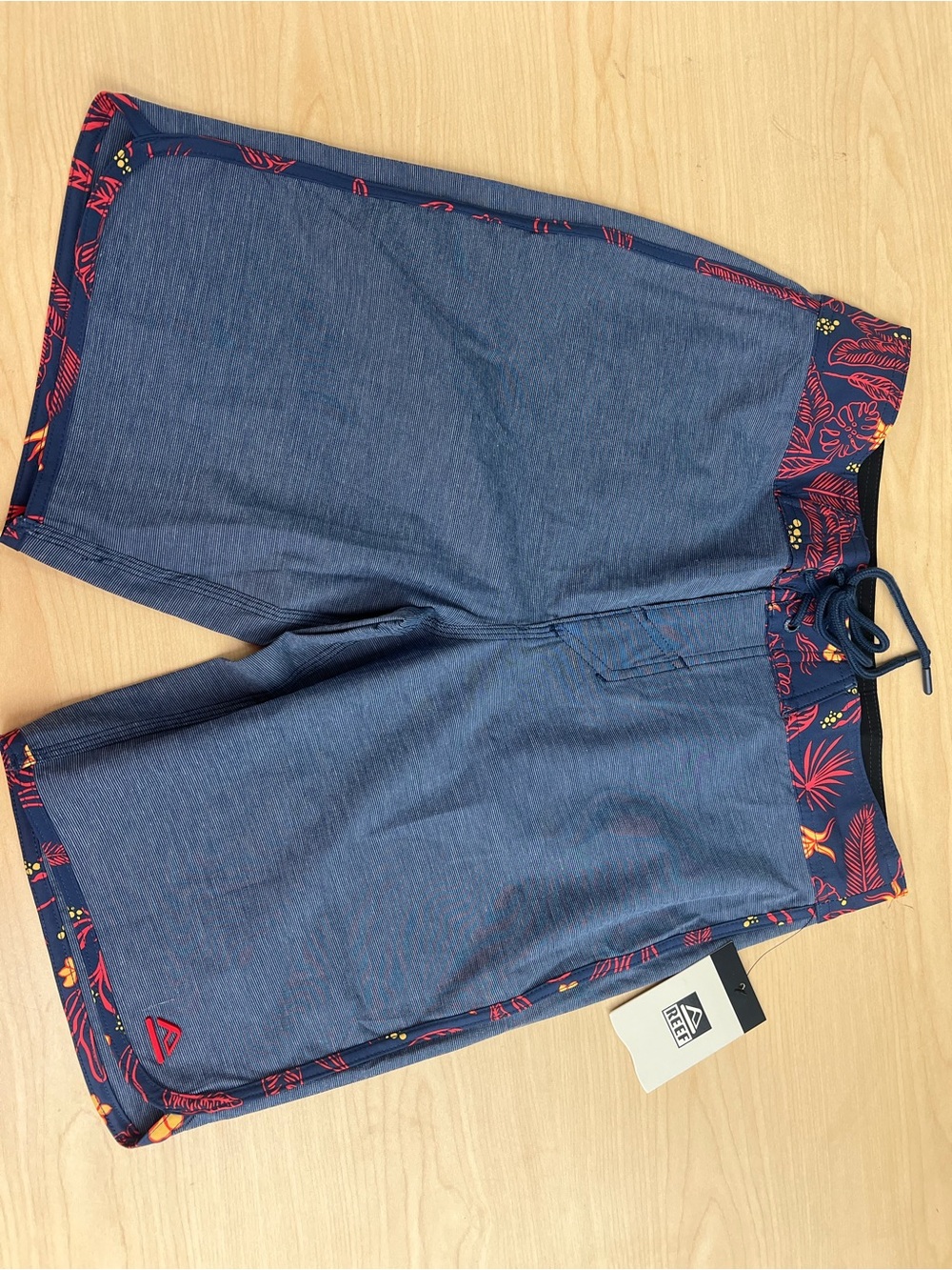 Reef Men’s Navy Boardshorts with Red Floral Trim